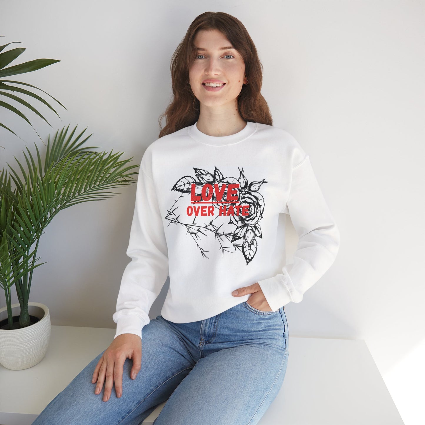 “Love conquers” sweatshirt